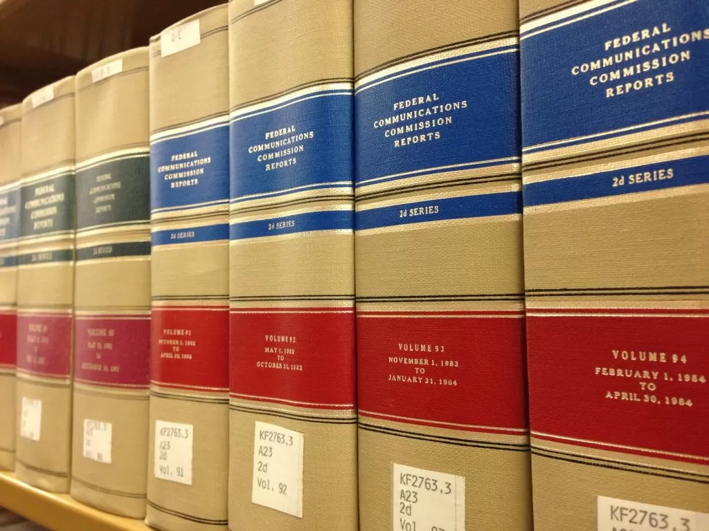 Rows of bound law report volumes on a shelf